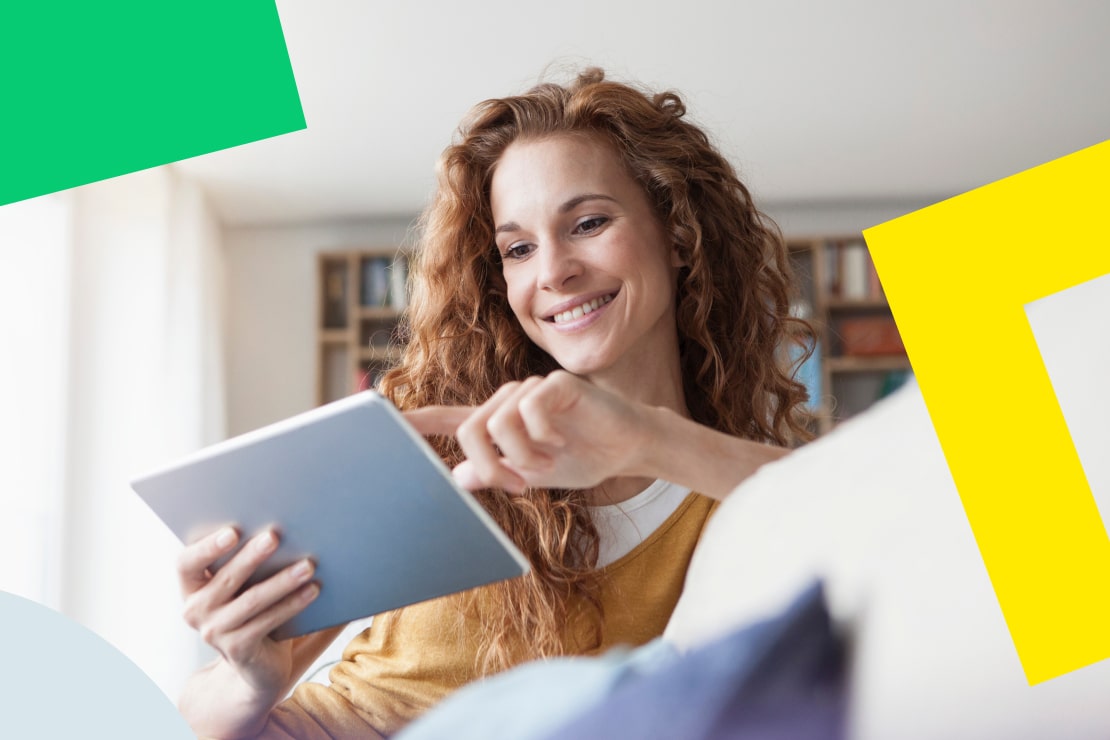 A woman smiling at her device, enjoying AI-generated summaries and transcripts to save time and stay customer-focused.